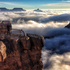 Tourists at Mather Point, Arizona, look out over a rare total cloud inversion at the Grand Canyon. Photo / AP