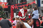  Santa was as popular as ever at the Mount Maunganui Santa Parade. Photo/Andrew Warner.