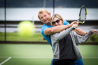 Justin Mackenzie gives Rachel Grunwell some tennis tips. Photo / Michael Craig