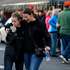 A parent picks up her daughter at a church where students from nearby Arapahoe High School were evacuated to after a shooting on the Centennial, Colorado. Photo / AP