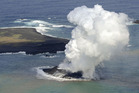 Volcanic eruption raises new island