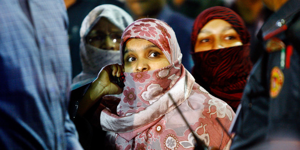 Family members of Abdul Quader Mollah, leader of the country's largest Islamic party Jamaat-e-Islami, wait to meet him at the Central Jail in Dhaka, Bangladesh. Photo / AP
