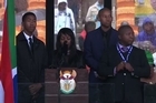 South Africa's deaf community on Wednesday accused the sign language interpreter at Nelson Mandela's memorial of being a fake, who had merely flapped his arms around during speeches. 