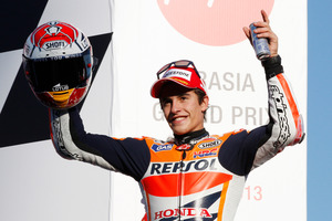 Marc Marquez  celebrates on the podium after finishing second in the MotoGP Japanese Grand Prix.Photo / AP