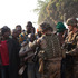 A French soldier tries to calm a hysterical boy after men were wounded by passing Chadian troops during a protest outside Mpoko Airport in Bangui, Central African Republic. Photo / AP