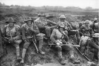 Soldiers resting by a road in France in December 1916. Image number E00019