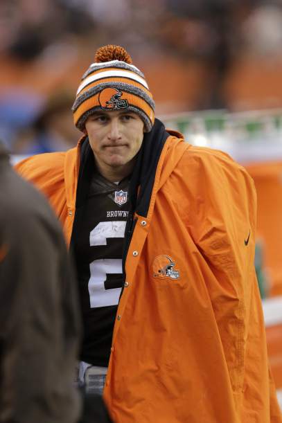 Cleveland Browns quarterback Johnny Manziel watches from the sidelines in the fourth quarter of an NFL football game against the Cincinnati Bengals in Cleveland on Dec. 14, 2014.