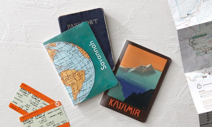 Passport holders personalized with maps and landscape