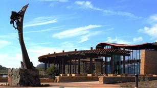 Outdoor welcome plaza at entrance to visitor center.
