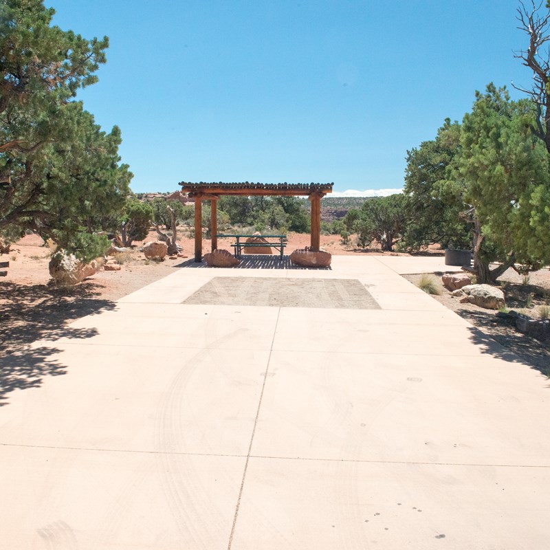 an accessible campsite with paved surfaces surrounding the site
