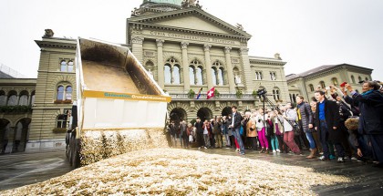 Coins poured outside of the Federal Palace in Bern