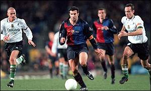 Luis Figo has quit Barcelona to join rivals Real