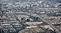 Aerial view of central Orange County overlooking South Coast Metro, John Wayne Airport, and the Irvine business district.JPG