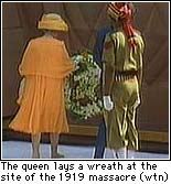 The queen lays a wreath