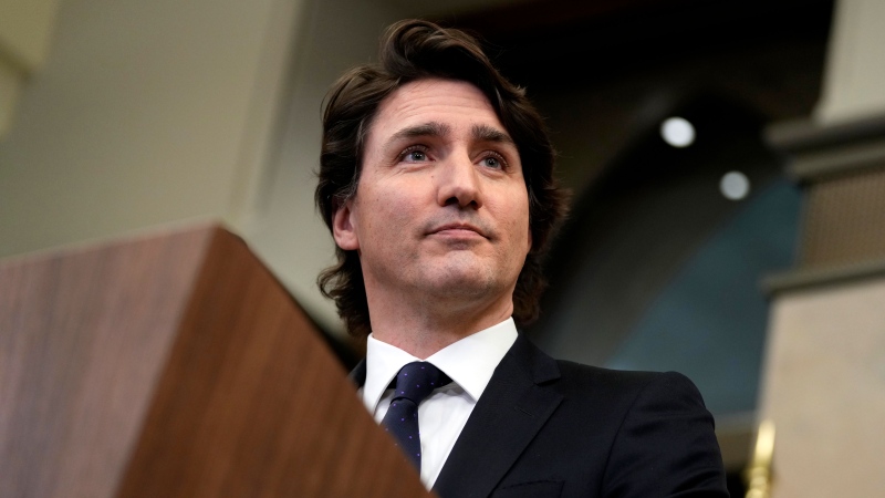 Prime Minister Justin Trudeau speaks during a media availability about the ongoing protests in Ottawa and blockades at various Canada-U.S. borders, in West Block on Parliament Hill, in Ottawa on Friday, Feb. 11, 2022. THE CANADIAN PRESS/Justin Tang
