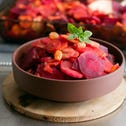 Tsimmes made from carrots and other roasted vegetables including beet, another symbolic food. 