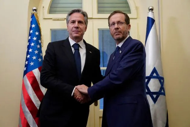 Israeli President Isaac Herzog (right) said 