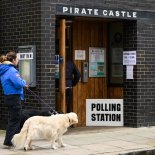 Article thumbnail: LONDON, ENGLAND - MAY 02: Polling Station signs are seen outside the "Pirate Castle" outdoor activities centre as members of the public cast their votes during the London Mayoral election on May 02, 2024 in London, England. Polls have opened across 107 authorities in England where voters are set to determine the fate of nearly 2,700 council seats. (Photo by Leon Neal/Getty Images)