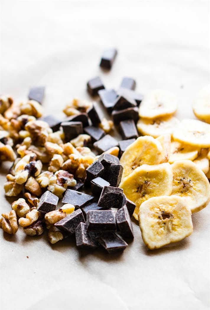 paleo trail mix recipe ingredients: banana chips, nuts, and vegan chocolate chunks