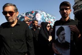 Mourners attend a funeral for victims of the helicopter crash that killed Iran&#039;s President Ebrahim Raisi, Foreign Minister Hossein Amirabdollahian and others, in Tehran, Iran, on May 22, 2024 [Majid Asgaripour/WANA via Reuters]