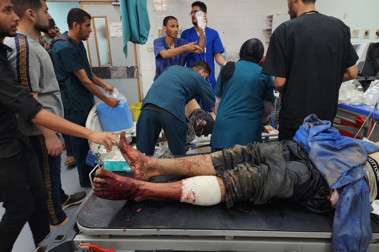 Dozens of wounded Palestinians are brought to the European Hospital in Khan Yunis city for treatment after the Israeli army attacked aid warehouses east of Rafah