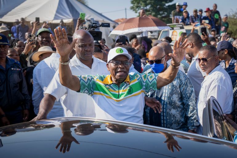 Former president of the A.N.C. and South Africa, Jacob Zuma, waves to supporters after casting his ballot in Nkandla, Kwazulu Natal, South Africa, Wednesday, May 29, 2024 during the general elections. South Africans are voting in an election seen as their country's most important in 30 years, and one that could put them in unknown territory in the short history of their democracy, the three-decade dominance of the African National Congress party being the target of a new generation of discontent in a country of 62 million people. (AP Photo/Emilio Morenatti)