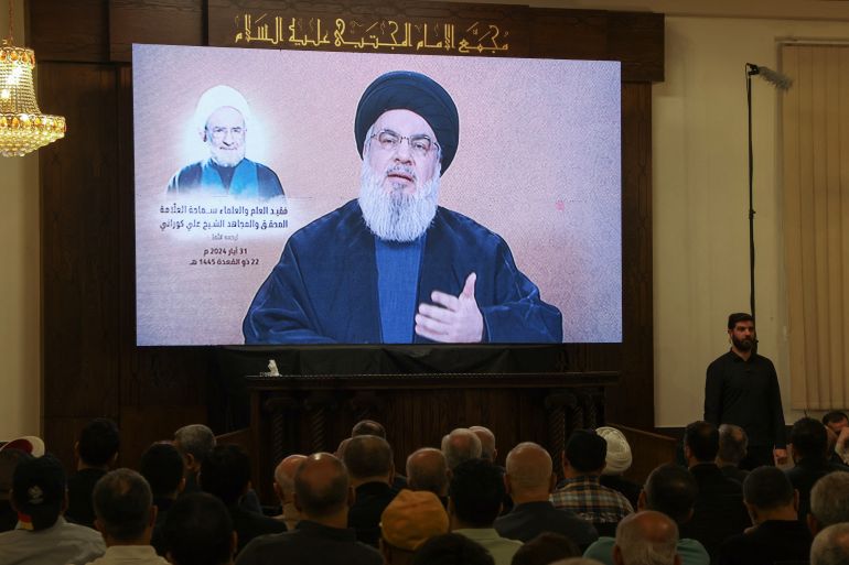 Lebanon's Hezbollah leader Sayyed Hassan Nasrallah gives a televised address during a ceremony, in Beirut's southern suburbs