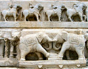 Elephants and cavalry carved in marble