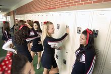 Cheerleaders at Lockers between Classes