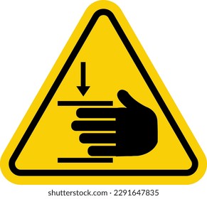 Hand injury sign. Hand crush sign. Pinching point. Warning sign. Yellow triangular sign with a silhouette of a hand and pressure inside. Risk of hand injury. The power of crushing hands from above. Immagine vettoriale stock