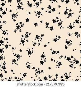 Simple vintage pattern. Small black flowers, leaves and dots. Light beige background. Fashionable print for textiles and wallpaper. เวกเตอร์สต็อก