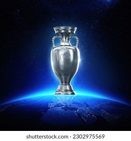 Karachi, Pakistan. 15 May. uefa euro cup 2024 celebration winning trophy with stadium. 3d rendering illustration.: redactionele stockillustratie
