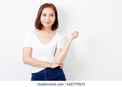 30-39 years, Young beautiful asian woman thai in t-shirt and jeans on white wall backgroundの写真素材