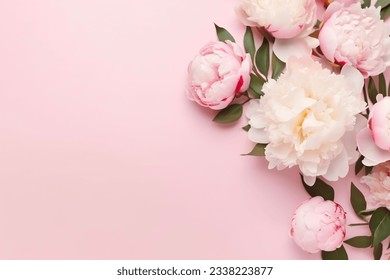 Tender peonies on pink background with copy space. Abstract natural floral frame layout with text space. Romantic feminine composition. Wedding invitation. International Women day, Mother Day concept Stock Photo