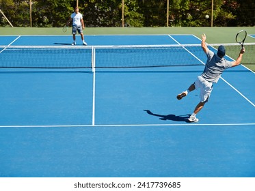 Tennis, game and men with fitness, friends and competition with training and exercise with sunshine. Players, tournament and guys with rackets and court with workout and challenge in the summer Stock-foto