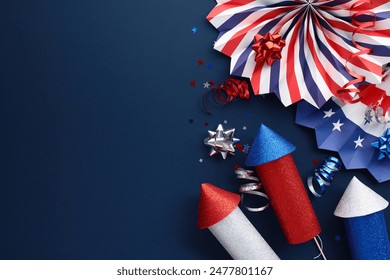 Top view of American patriotic background with fireworks, paper fans, party streamers, confetti stars on a dark blue background Stock-foto