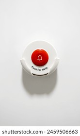 病院の救急ボタンの縦長フォーマット写真。背景は白の写真素材