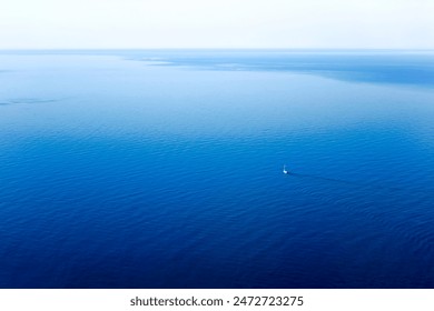 Стоковая фотография: View of the sailing yacht on the blue Mediterranean Sea, seen from Majorca Island, Spain