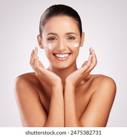Woman, portrait and cream in studio for skincare, hydration and moisturizer or beauty on white background. Female person, dermatology and lotion for facial treatment, pamper routine and sunscreen: stockfoto