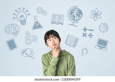 Young Asian girl and school subjects concept. Stock Photo