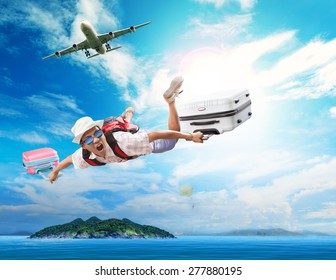 young man flying from passenger plane to natural destination island on blue ocean with happiness face emotion use for people traveling on vacation holiday in summer season  Stock Photo