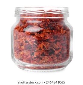 Aromatic spice. Red chili pepper flakes in jar isolated on white, fotografie de stoc