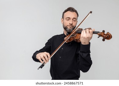 Attractive bearded violist man playing instrument Stock-foto