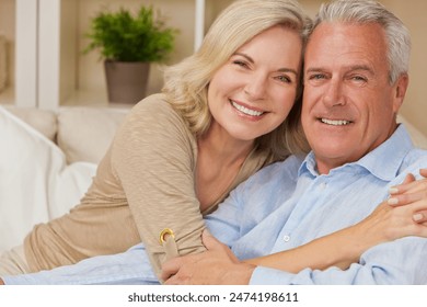 Attractive Healthy Senior Man Woman Couple at Home Smiling Stock-foto