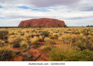 Ayers Rock Northern Territory Australia 09 14 2022 A mythical rock at twilight with clouds in the sky - Φωτογραφία στοκ editorial