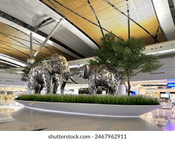Bangkok, Thailand - January 2, 2024 : The SAT-1 terminal constitutes a key part of the Suvarnabhumi Airport’s phase-two, which consists of several sub-projects to strengthen the Airport’s capability t Redaktionellt stockfoto