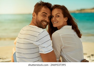 Back, portrait and smile with couple on beach together for anniversary, holiday date or romance in summer. Love, travel or vacation with happy man and woman on tropical island paradise for honeymoon Stock-foto