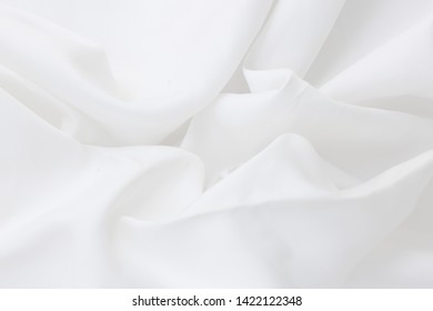 The background of the white fabric that is wavy – Image : photo de stock