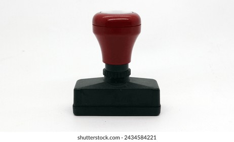 Black wooden rubber stamp isolated on white background: stockfoto
