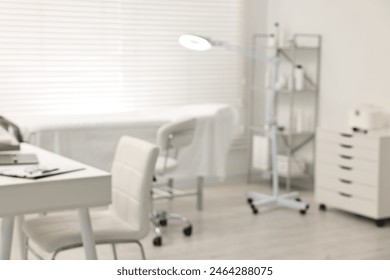 Blurred view of dermatologist's office with examination table Stockfotó